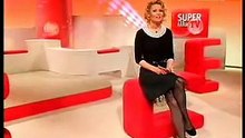 Clara Buchner -GermanTv sexy legshow! black pantyhose -high heels