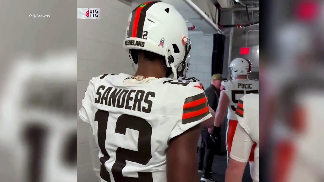 Shedeur and Deion Sanders share a father-son moment before the game