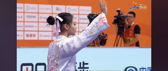 "A beautiful female Wushu martial artist"