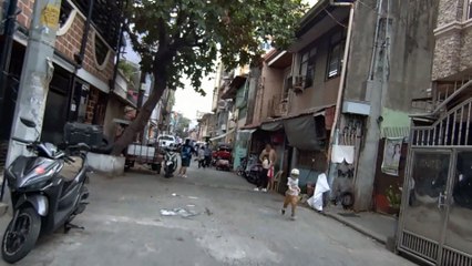 Kids Are Playing on Lt. Garcia Street in Paranaque City in the Philippines