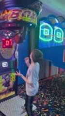 Boy Gets Lowest Score Possible on Punching Machine at Arcade