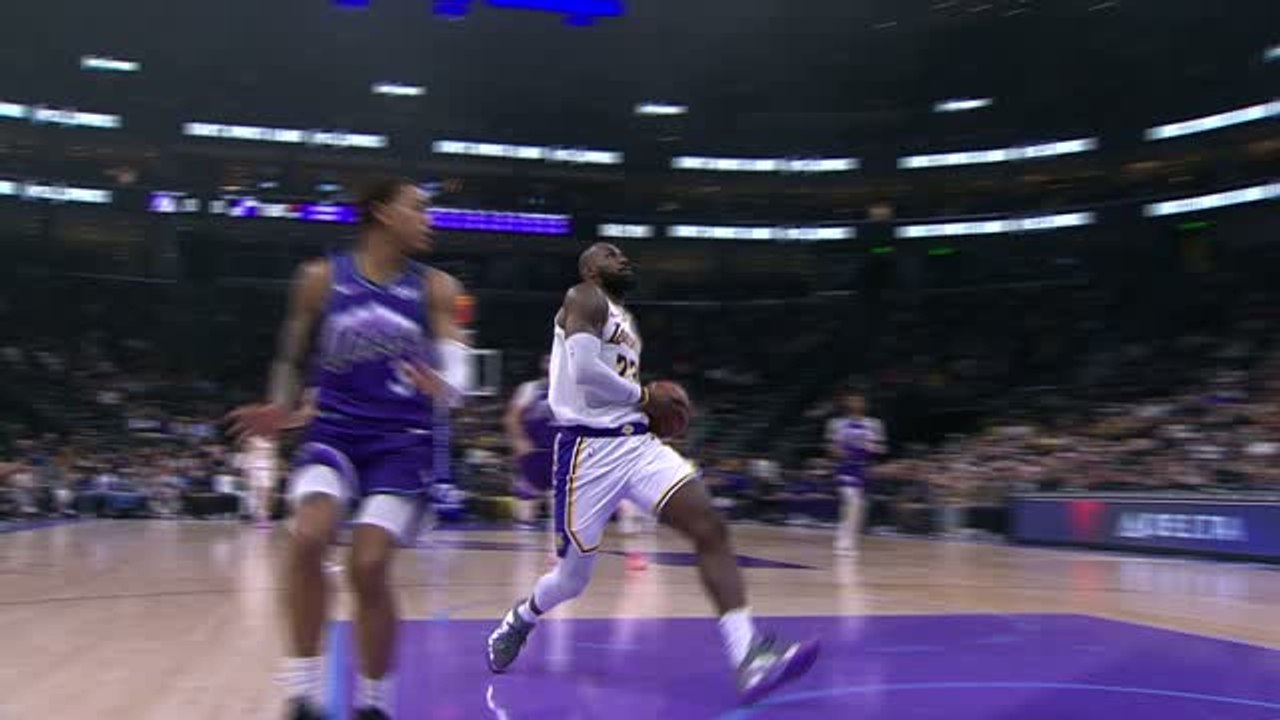 LeBron glides in for big dunk