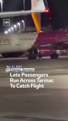 Late Passengers  Run Across Tarmac To Catch Flight