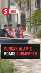 Major roads in Puncak Alam submerged, stranding motorists