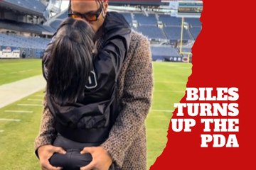 Simone Biles gets an intense squeeze as Jonathan Owens turns up the pda