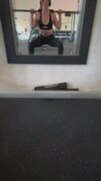 Woman Uses Her Pants as Phone Holder While Exercising