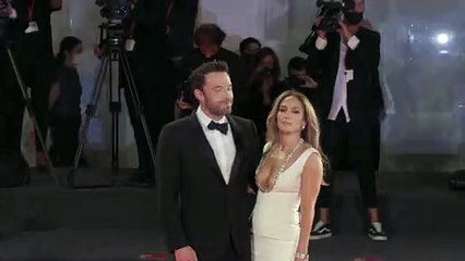 Jennifer Lopez & Ben Affleck Team Up For A Christmas Duet & Share A Kiss At Their Holiday Party