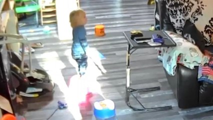 Hilarious moment as toddler's sneeze results in him toppling straight to the floor
