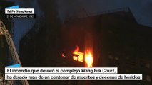 Los equipos de emergencias rastrean el bloque incendiado en Hong Kong en busca de supervivientes