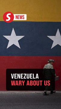 Venezuelan citizens wary but defiant after US implicates Maduro and calls group terrorists