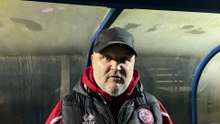 Woking assistant manager Simon Bassey post-Brighton & Hove Albion under-21s