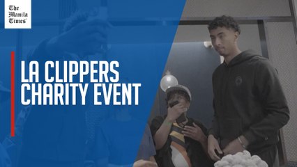 LA Clippers serve Thanksgiving meals, pose for photos with fans