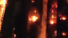 Regardez les images impressionnantes de ce violent incendie qui a touché un complexe résidentiel de Hong Kong faisant au moins quatre morts - VIDEO