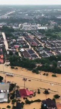 Buildings submerged by flooding in Thailand after being battered by severe rain
