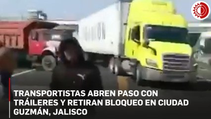 Transportistas abren paso con tráileres y retiran bloqueo en Ciudad Guzmán, Jalisco