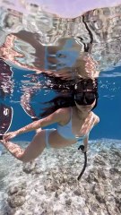 Beautiful Girl Diving in Wonderful Ocean