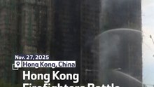 Hong Kong Firefighters Battle High-rise Blaze