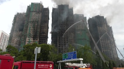 홍콩 행정장관 "아파트 7개 동 모두 진화"...화재 발생 27시간만 / YTN