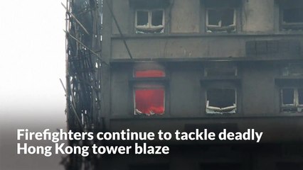 Firefighters continue to tackle deadly Hong Kong tower blaze