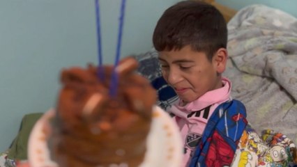 Little boy excitedly wakes up his elder brother to celebrate his birthday