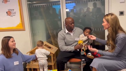 Sweet moment baby clings to Kate during visit to children’s mental health charity