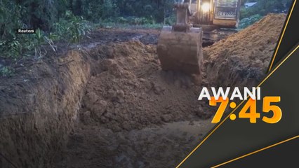 Sejumlah mayat dikebumikan dalam kubur besar di Sumatera