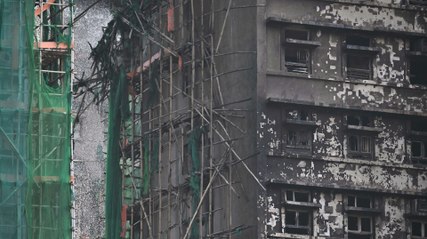 Opferzahlen nach Großbrand in Hongkong steigen weiter, Brandmelder versagten