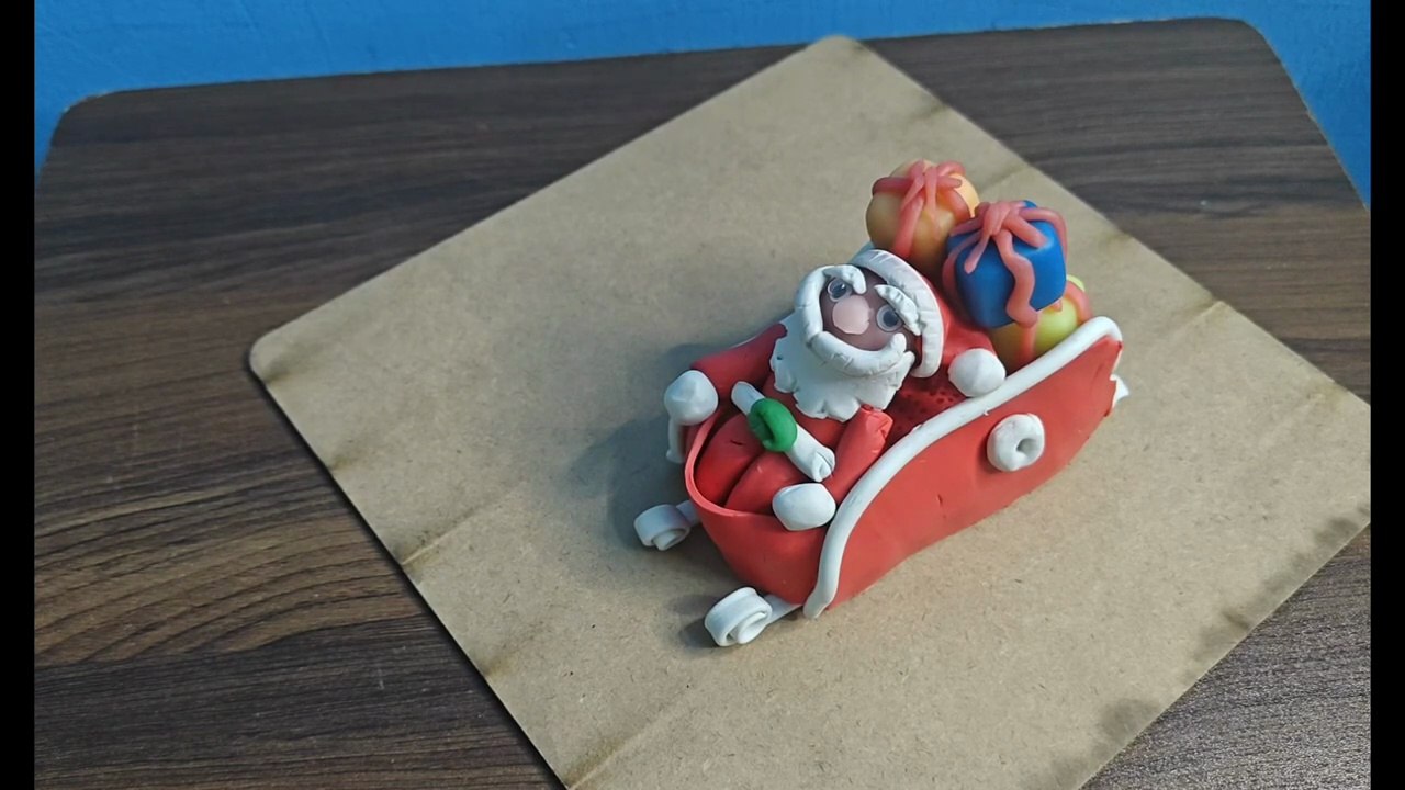 Santa Claus Carriage Clay Art | Christmas Gifts || Christmas Clay Art – Santa and Gift Carriage || Cute Santa Claus Clay Sculpture | Holiday Craft || Santa’s Christmas Carriage Clay Art || DIY Santa Clay Art – Gifts & Carriage