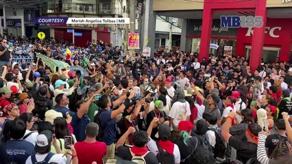Protesters sing "Bayan Ko" at anti-corruption rally along Recto Avenue, Manila