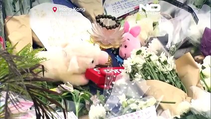 Miles en Hong Kong hacen cola para presentar sus respetos tras el mortal incendio en Tai Po