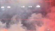 Soccer match post-poned after fans launch fireworks onto field