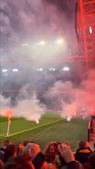 Soccer match post-poned after fans launch fireworks onto field