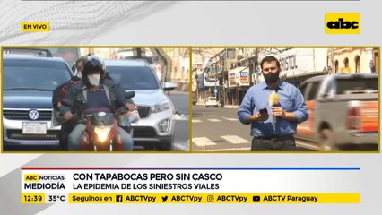 Motociclistas, con tapabocas pero sin casco