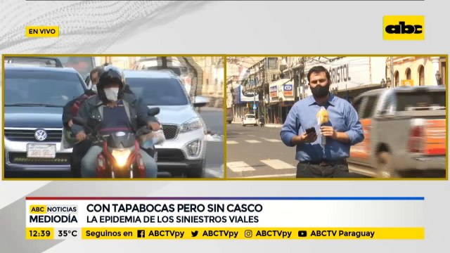 Motociclistas, con tapabocas pero sin casco