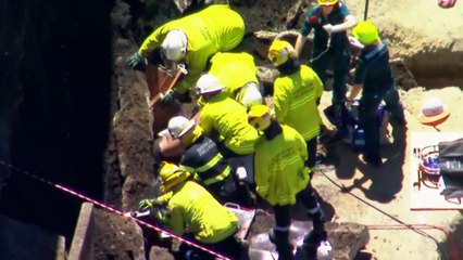 One man dead another seriously injured in Brisbane wall collapse