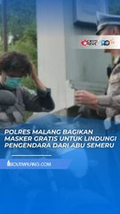 LINDUNGI PENGENDARA DARI ABU SEMERU, POLRES MALANG BAGIKAN MASKER GRATIS KE MASYARAKAT
