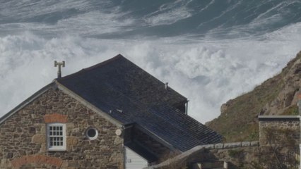 Storm Amy unleashes awe-inspiring waves that collide dramatically with Cape Cornwall coast