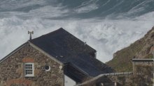Storm Amy unleashes awe-inspiring waves that collide dramatically with Cape Cornwall coast