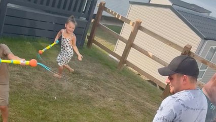 Hilarious mix-up during water fight leaves BBQ food soaked instead of served