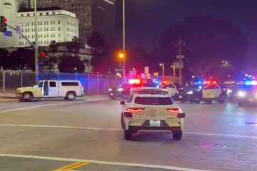 Waymo’s autonomous car rolls into an active standoff as terrified passengers react to the wild scene