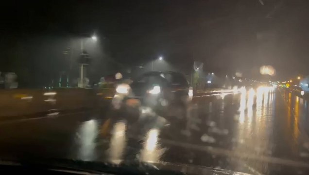 Larga Fila De Peregrinos Con Destino A Caacupé Bajo La Lluvia