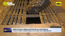 Usan un tambor para señalar una alcantarilla abierta sobre Molas López