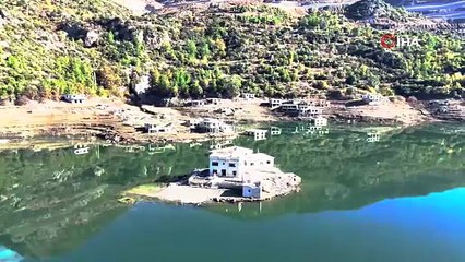 Kuraklık Kıbrıs'a içme suyu sağlayan barajı da vurdu: Su altındaki köy ortaya çıktı