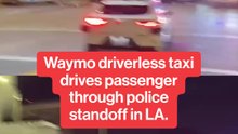 Waymo driverless taxi drives passenger through police standoff in LA.