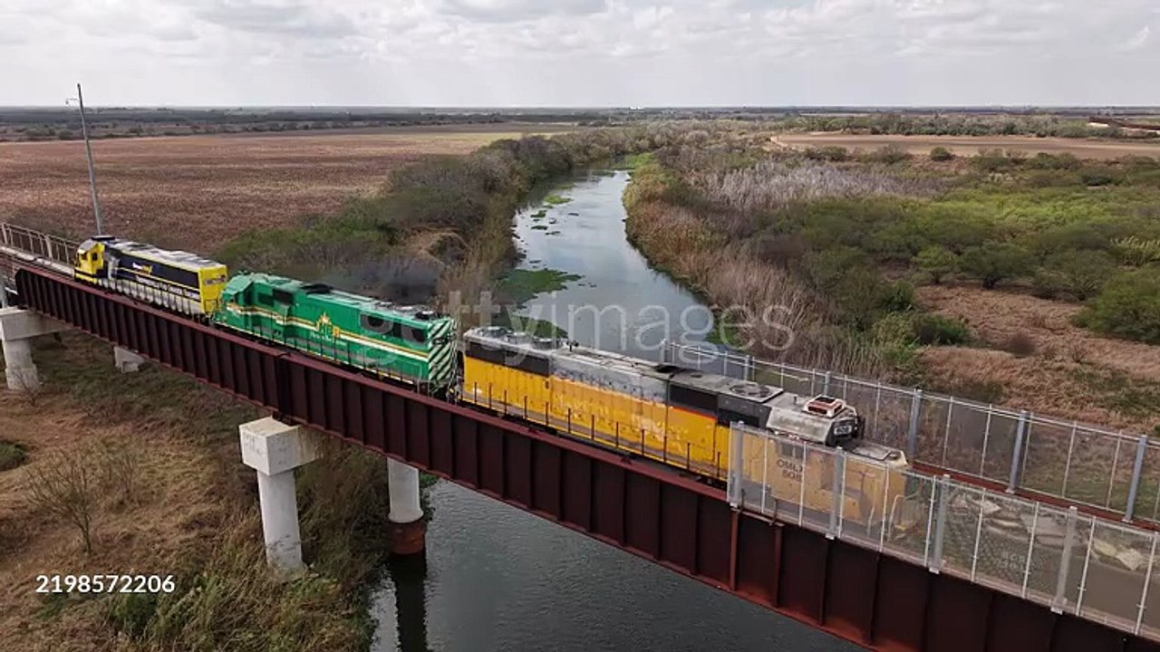 A Train Enters Mexico From The United States Over The West Rail Bridge In Brownsville, Texas, USgettyimages-2198572206-640_adpp