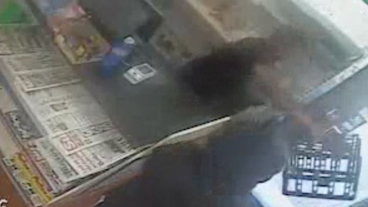 Brave shopkeeper fights off knife-wielding robber with milk crate