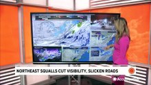 Snow squalls cut visibility and slicken roads in the Northeast