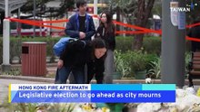 Hong Kong To Go On with Election As City Mourns Fire Victims