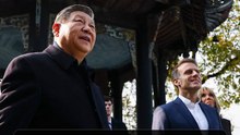 Macron, Xi hold informal talks at ancient dam site outside of Beijing