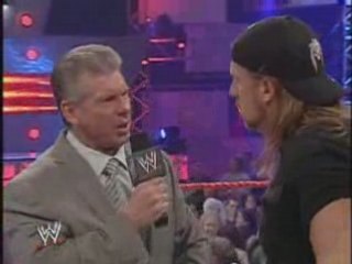 Mr. McMahon attempts to make Triple h join the kiss